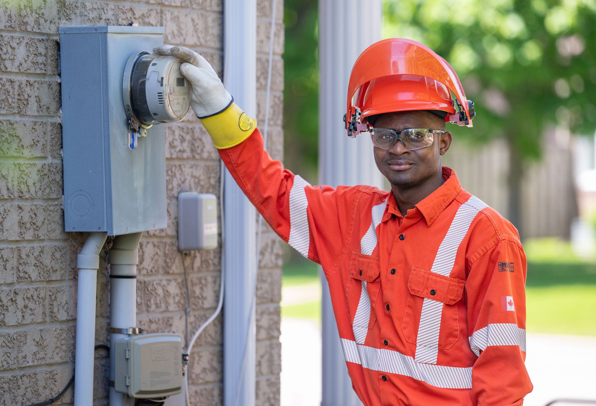 meter tech posing with meter