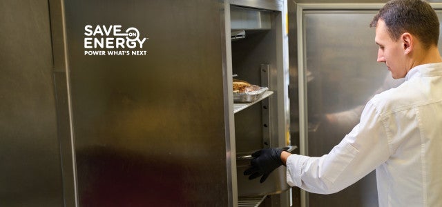 Chef opening the fridge