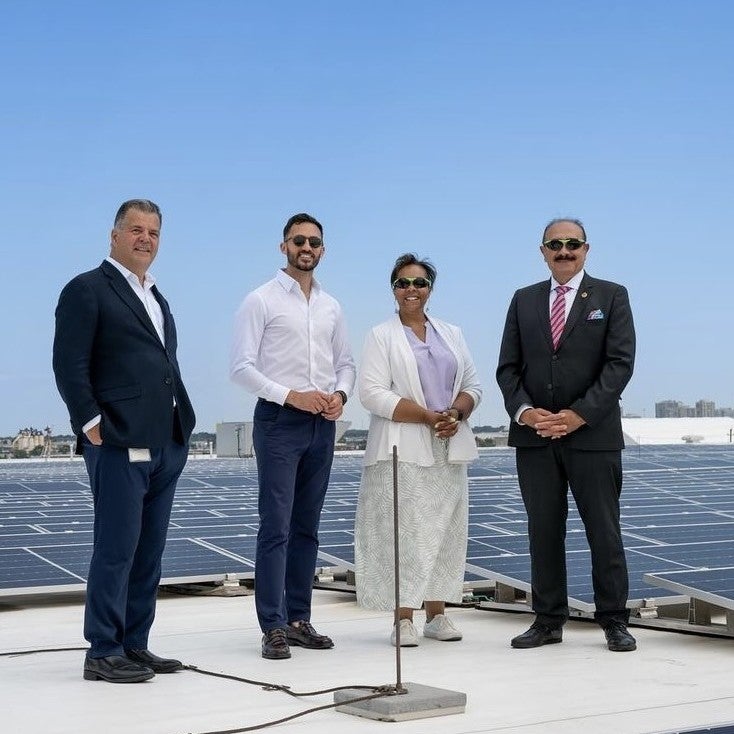 group photo with solar panels