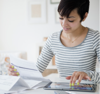 woman looking at a bill