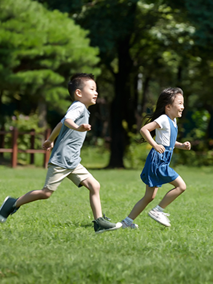 Kids running in a park